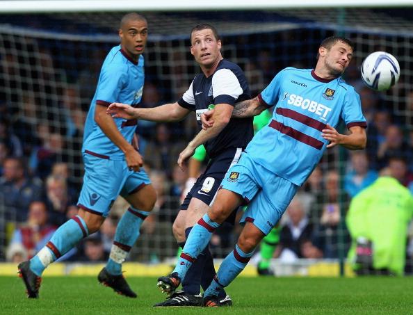 Millwall manager Neil Harris (centre) during his playing days